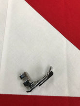 Singer 1/4" Featherweight foot.
