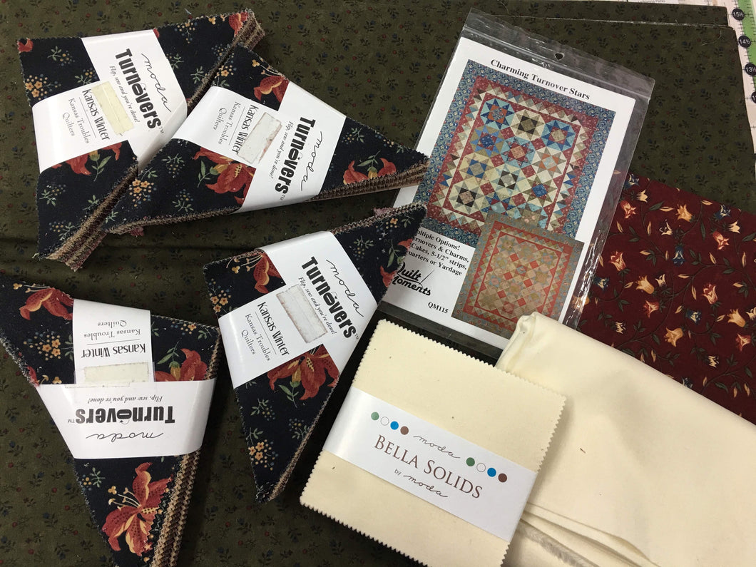 Charming Turnover Stars with Moda Kansas Troubles collection turnovers. 67 X 90.