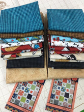 Home is Where the Dog is.  pattern Sheryl, size 48 X 57.