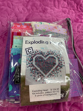 Tula Pink,  #C  Exploding Heart Kit includes pattern, 20 fq, background, & binding.  (One of a kind)